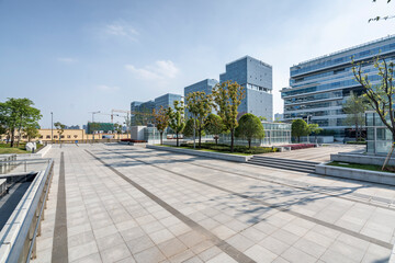 modern business office buildings with empty road,empty concrete square floor	
