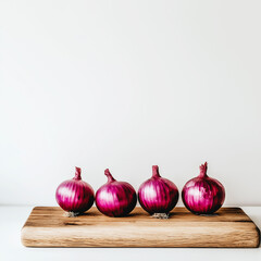 Fresh and vibrant red onions placed on a wooden cutting board