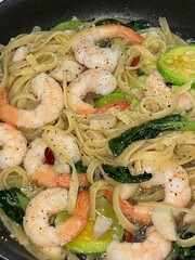 Gambas spaghetti with succulent shrimp, garlic, olive oil, and chili flakes—a perfect fusion of seafood richness and Italian flavor in every bite.