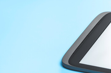 Modern e-book with clean empty screen. Blank for text. Concept of reading and storing books.