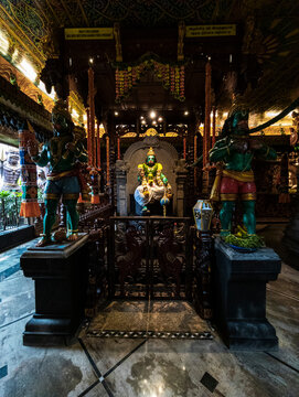 Interior of Hindu temple with statues