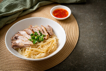dried duck noodles in white bowl
