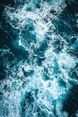 Obraz premium Aerial view of Ocean waves creating abstract patterns