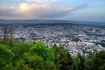 Cityscape of Tbilisi, the capital of Georgia, aerial panoramic view from Mtatsminda Park