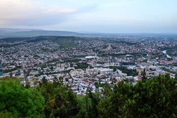 Cityscape of Tbilisi, the capital of Georgia, aerial panoramic view from Mtatsminda Park