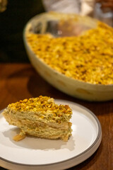 Pistachio Tiramisu served on plate in the restaurant