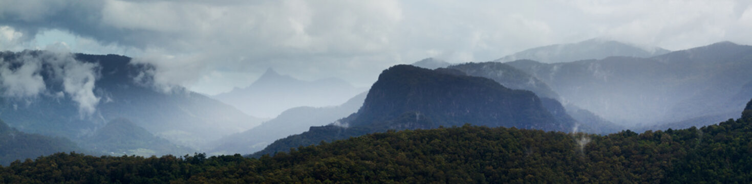 Stormy moody weather among a mountain range.
