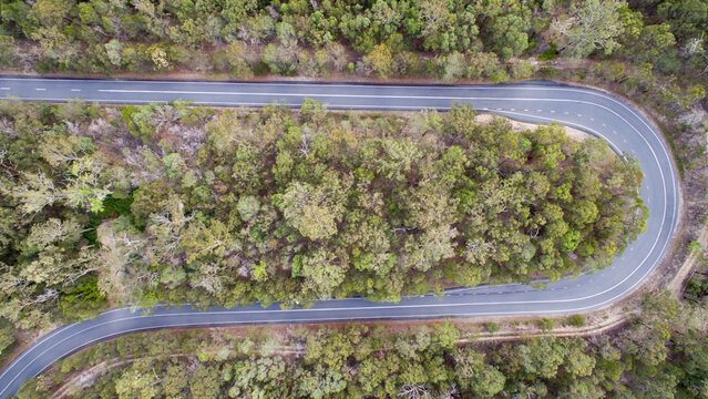 Aerial view of a switchback road.