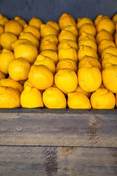 Box of Lemons stacked outside fruit shop