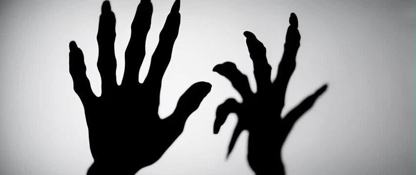 Anamorphic video Silhouette of a zombie hand