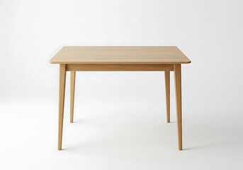 A simple square light wood table with tapered legs against a plain white studio backdrop for furniture ads