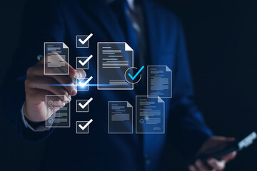 Electronic documents for business checklist concept, Businessman with electronic checking investment approval, executing plan, project approved, digital signature, digital business