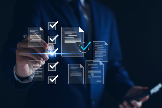 Electronic documents for business checklist concept, Businessman with electronic checking investment approval, executing plan, project approved, digital signature, digital business