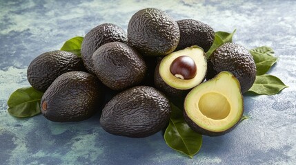 Fresh Avocados on Green Background with Leaves and Cut Fruit