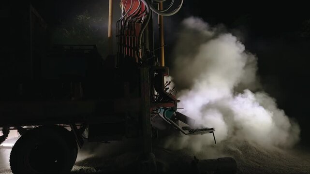 Night Drilling Rig Extracts Water in Rural Land