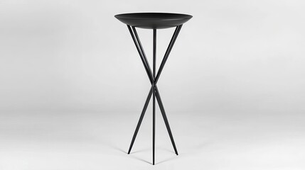 Naklejka premium Modern Minimalist Black Table with Sleek Tripod Legs Design