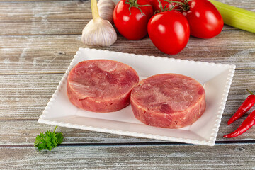 Raw round tuna fish fillet