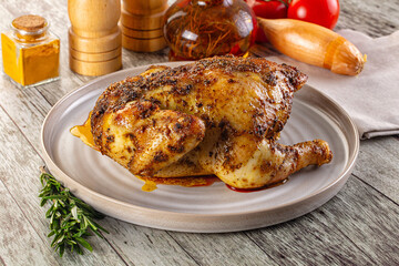 Baked in oven whole chicken with spices