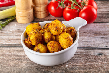 Baked small baby potato with herbs