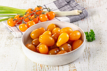 Marinated yellow cherry tomatoes heap
