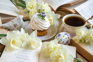Easter 2025 table decoration for the holiday with flowers and accessories.