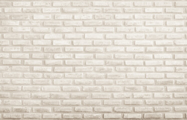 Detail of modern cream brick wall background photo. Brown light brick wall texture background for stone tile block painted in yellow light color wallpaper modern interior and exterior backdrop design.