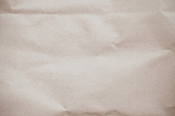 Old paper vintage texture surface for background. Recycle pale brown paper crumpled texture, Cream color recycled kraft paper texture blank with copy space for text.
