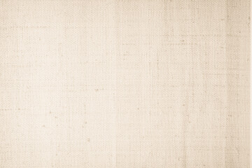 Fototapeta premium Brown sackcloth woven texture background in natural pattern. Jute hessian burlap, linen background in light beige cream color blank. Weaving canvas fiber line cotton cloth textured as organic.