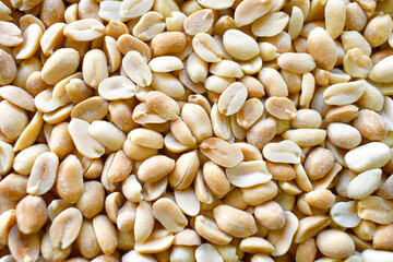 Salted peanuts texture background. Healthy dietary food.