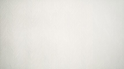 Simple, light grey, textured fabric with subtle chevron pattern