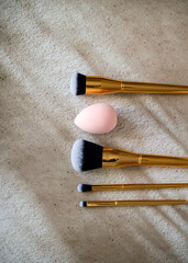 Golden Makeup brushes and beauty blender 