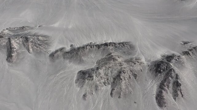 Heidu Mountain, Xinjiang, China, lunar-like landscape, moon surface terrain, barren desert, drone view, rugged mountains, remote wilderness, extraterrestrial scenery, alien landscape, aerial photograp