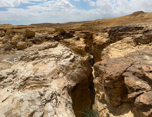Extreme trip in desert. Attractive and unique place - canyon sandy of color created by forces of...