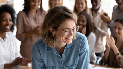 Happy Administrative Assistant Smiles at Work Surrounded by Supportive Colleagues in Bright Office Setting