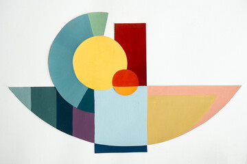 Vibrant composition of geometric shapes in bold colors, creating depth and texture with a modern, minimalist aesthetic.