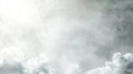 Obraz premium A soft, cloudy sky with light shining through, creating a peaceful and dreamy atmosphere.