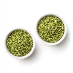 Fresh green tea leaves and a bowl of healthy green lentils are isolated ingredients for a vegetarian meal