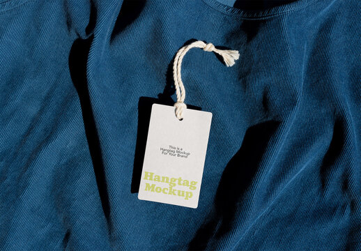 Cloth Label Mockup on a Blue Fabric Surface