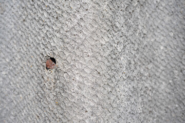 Old and very dangerous asbestos roof. Asbestos dust in the environment. Asbestos removal