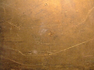 Close-up view of textured surface revealing intricate patterns and subtle variations in color and light