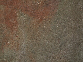 Textured surface with rich earthy tones showcasing natural patterns and subtle color variations
