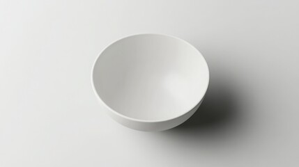 Minimalist Scandinavian ceramic bowl with matte glaze, isolated on light grey background
