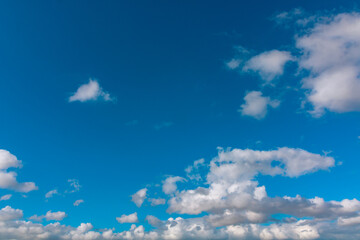 Blue sky with clouds. Cloudscape background photo.
