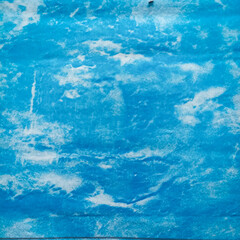 Abstract blue textured background resembling water surface, ideal for graphic design, backdrop, and creative visual projects.
