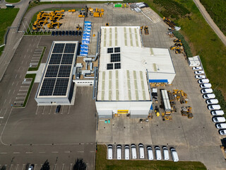Solar powered construction machinery distribution and service center. Aerial view