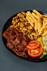 Mix chicken grill kabab, salad and French fries served in a dish, Arabic Platter, Mix Grill Platter with chicken, salad and fries