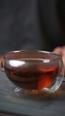 A Warm Brewed Tea in a Beautiful Transparent Cup for Enjoying its Rich Aroma and Flavor. Media