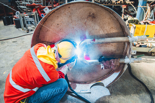 Industrial welding fabricated pipeline is tank stainless steel repair construction work in factory, Welding process by Gas Tungsten Arc Welding