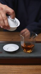 Elegant glassware enhances artisan tea preparation, delighting the senses fully. Media