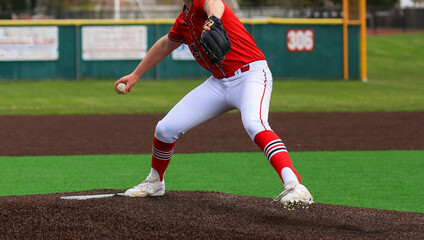 Pitcher throwing a pitch during a baseball game